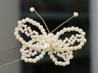 12月6日，在家兼職手工活，靈活就業(yè)創(chuàng)業(yè)手工副業(yè)，開飾品加工廠，與手工之家合作，安心在家通過純手工掙錢，圖為串珠米珠繡手工產品剪影